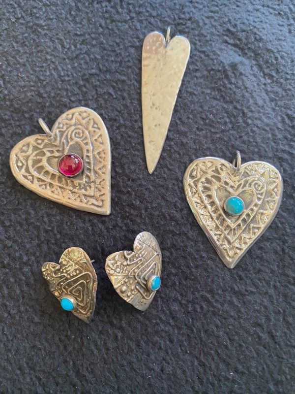 Heart Pendants and Earrings With Stones in the Middle